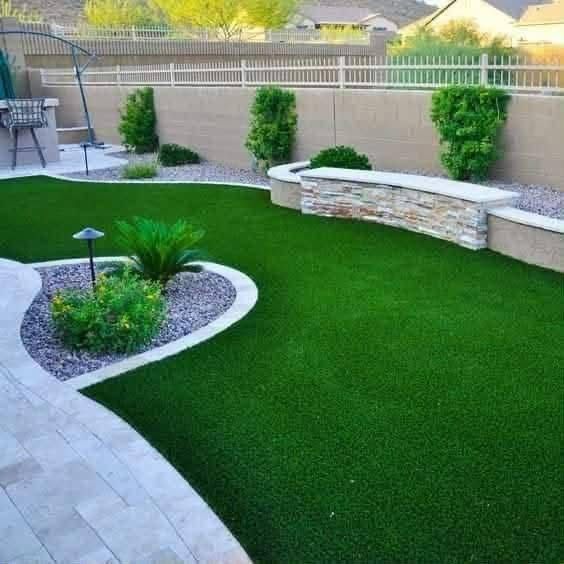 Outdoor landscaping installation with plants and pathways